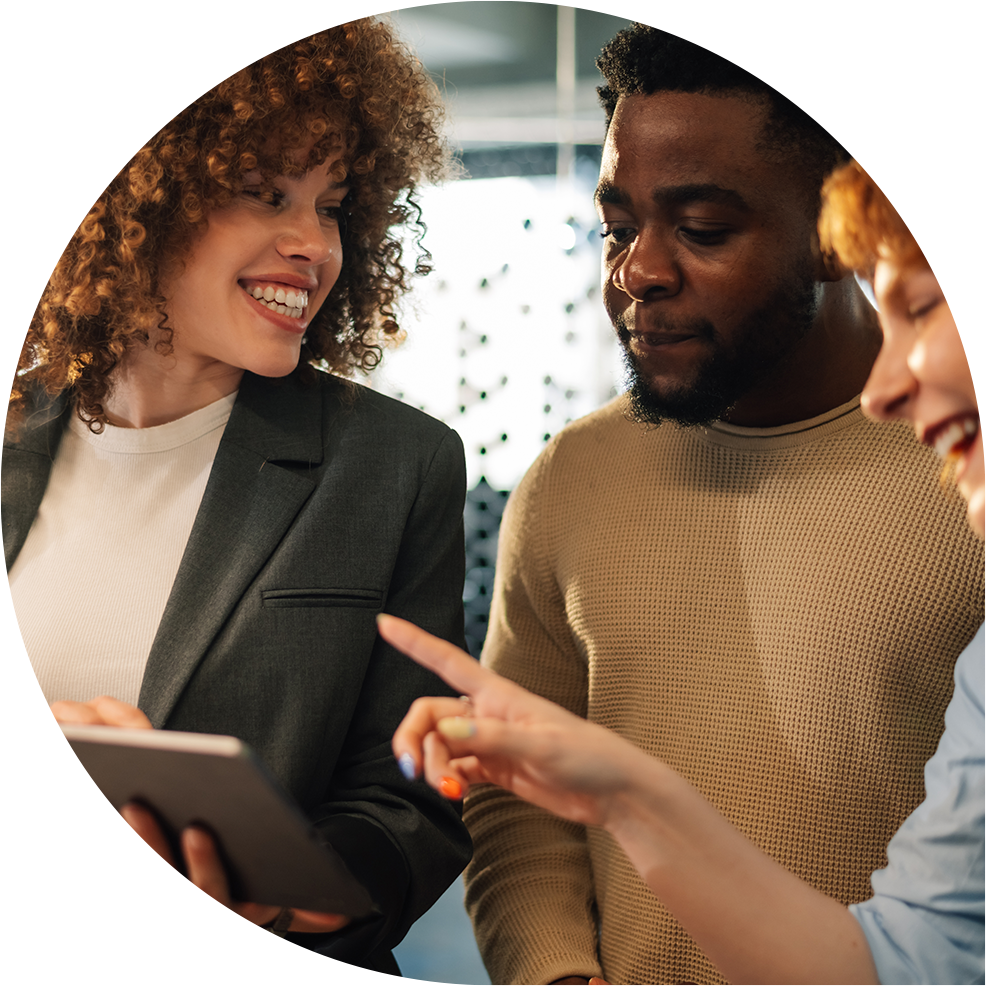 A business professional is seen reviewing data protected information on a business computer in a modern office setting.