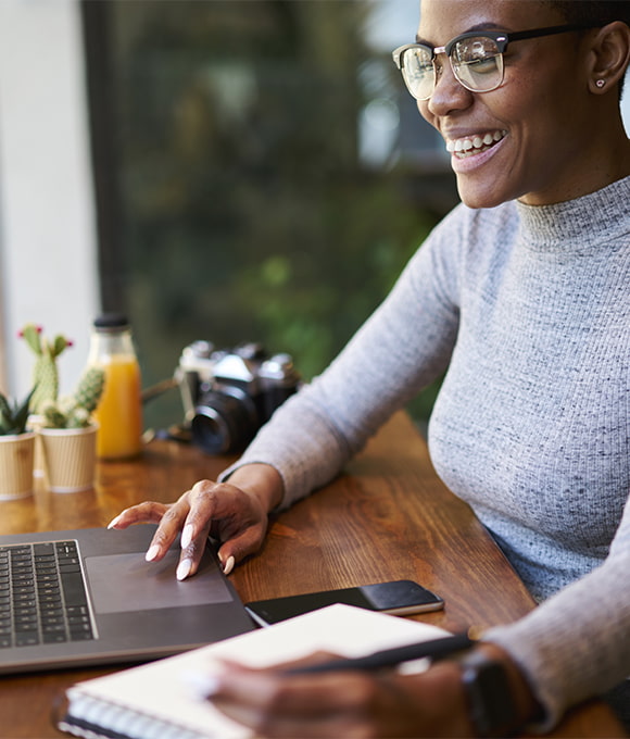 Woman smiling while working from home